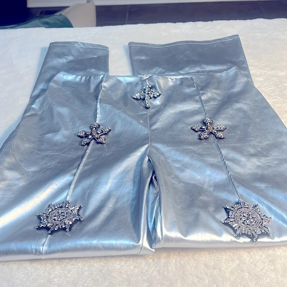 NWT Fashion NOVA Silver Faux Leather Flare Silver Pants w/ Rhinestone Crosses - Picture 8 of 16
